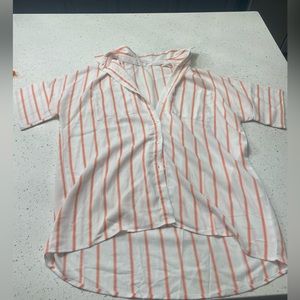 Women short sleeve one size. Purchased from Amazon.